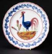 LLANELLY POTTERY COCKEREL PLATE circa 1900, continuous leaf and flower border in blue, the