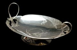 IMPERIAL RUSSIAN 'AESTHETIC' SILVER FRUIT BOWL, c.1910, oval lobed with pierced high loop handles,