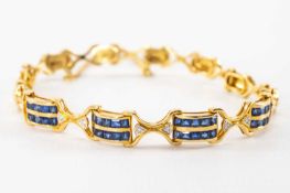 18K GOLD SAPPHIRE & DIAMOND BRACELET, having four double row panels of ten sapphires each accented