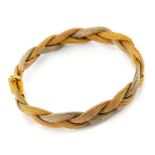 FINE 18CT GOLD TRI-COLOUR BRACELET of woven design, integrated box clasp, 19cms long, 21.8gms