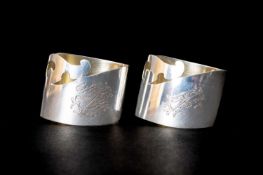 PAIR IMPERIAL RUSSIAN 'AESTHETIC' SILVER NAPKIN RINGS, c. 1910, engraved with 'MCN' and 'EN'