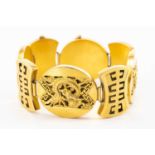 YELLOW GOLD CHUNKY PANEL BRACELET, of Chinese design decorated with panels of foliage and dragon,