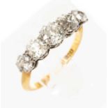 18CT YELLOW GOLD FIVE STONE DIAMOND RING, the graduating old European cut stones totalling 1.5cts
