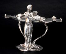 W.M.F. ELECTROPLATED FIGURAL CALLING CARD STAND, cast as a winged nymph stroking a dove, the broad