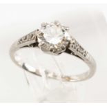PLATINUM DIAMOND SOLITAIRE RING, the single claw set stone measuring 0.75cts approx., diamond chip
