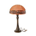 MOGENS BALLIN FOR HERTZ BALLIN, DENMARK, Art Nouveau copper table lamp, with red domed and netted