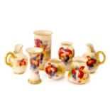 KITTY BLAKE FOR ROYAL WORCESTER: group comprising pair of shape 1094 jugs, shape 923 trumpet vase,