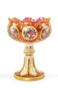 BOHEMIAN OVERLAID GLASS VASE, c. 1900, painted with eight oval panels of flowers, 19cm hCondition