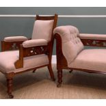 MATCHING VICTORIAN WALNUT CHAISE LONGUE & ARMCHAIR, with carved arms, on brown ceramic castors,