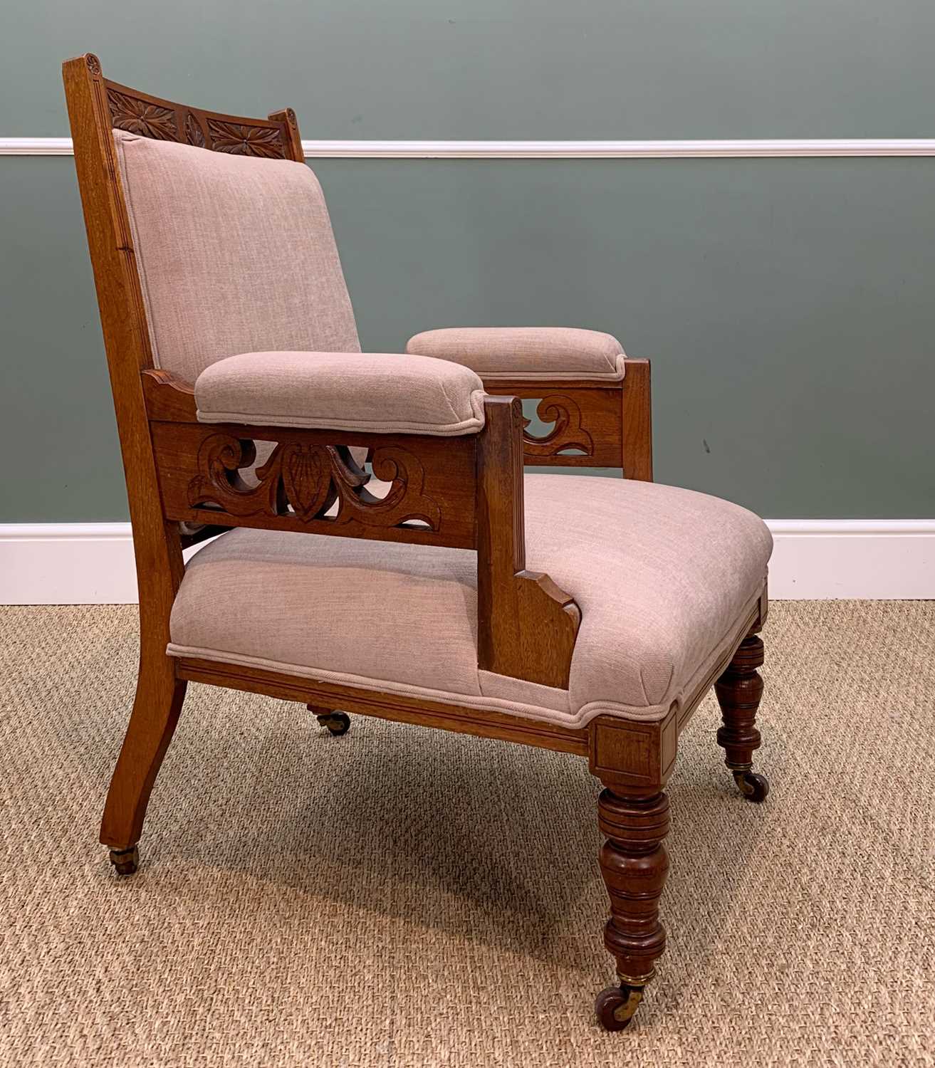 MATCHING VICTORIAN WALNUT CHAISE LONGUE & ARMCHAIR, with carved arms, on brown ceramic castors, - Image 6 of 10