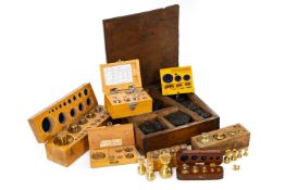 VARIOUS CASED SETS OF MEASURES, comprising one set brass 200g-20g, one set brass Arnold & Sons