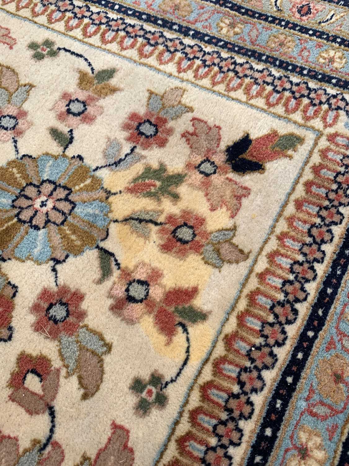 MODERN ORIENTAL CARPET, red central medallion with mosque lamps, on a dark field with floral ivory - Image 6 of 7