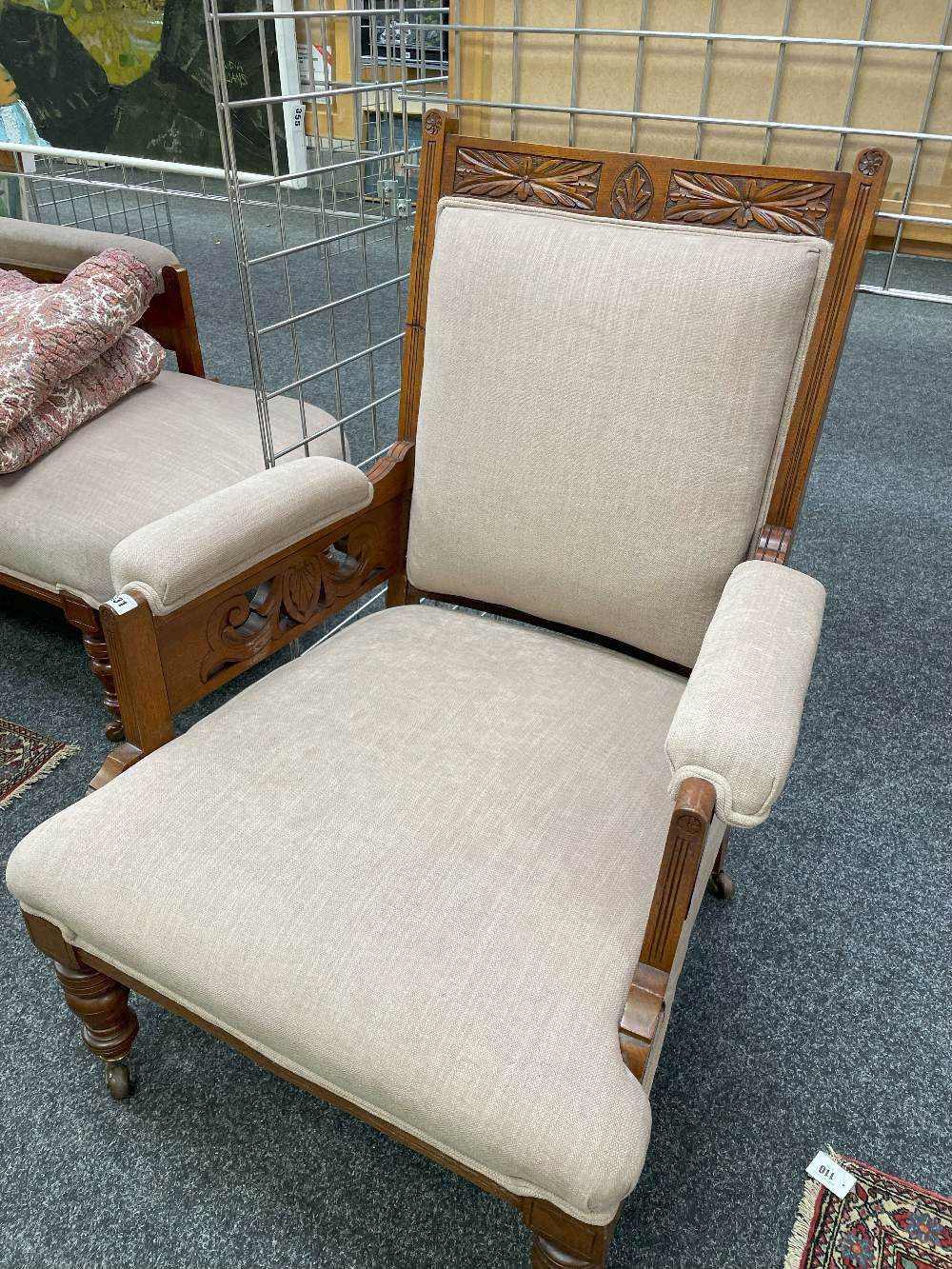 MATCHING VICTORIAN WALNUT CHAISE LONGUE & ARMCHAIR, with carved arms, on brown ceramic castors, - Image 7 of 10