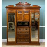 JAMES SHOOLBRED WALNUT COMPACTUM, c. 1900, carved cornice above twin mirrors flanking carved