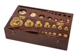 SET SIXTEEN BAIRD & TATLOCK BRASS SCIENTIFIC METRIC WEIGHTS, from 5 kilograms to 1gram, in fitted