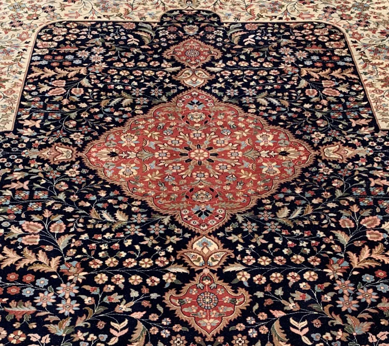 MODERN ORIENTAL CARPET, red central medallion with mosque lamps, on a dark field with floral ivory - Image 2 of 7