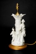 GERMAN WHITE PORCELAIN 'CHINOISERIE' TABLE LAMP, modelled with two figures around a tree,