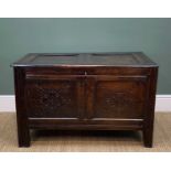 17TH CENTURY JOINED-OAK COFFER, channel carved double-panelled top above panelled front carved