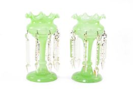 PAIR VICTORIAN GREEN GLASS LUSTRES, hung with prismatic drops (2) Comments: two drops missing from