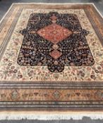 MODERN ORIENTAL CARPET, red central medallion with mosque lamps, on a dark field with floral ivory