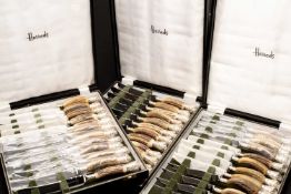HARRODS SETS OF ANTLER-HANDLED KNIVES, comprising one boxed set of twelve table knives, one boxed