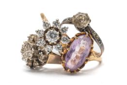 FOUR GOLD RINGS comprising 9ct gold amethyst ring, 9ct gold cubic zirconia ring, 9ct gold diamond