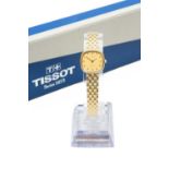 9CT GOLD TISSOT LADY'S 'SAPHIR' WRISTWATCH, the champagne dial with baton hour markers, having