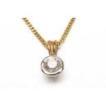 9CT GOLD DIAMOND PENDANT, the single stone measuring 0.25cts approx., rub over setting, on fine