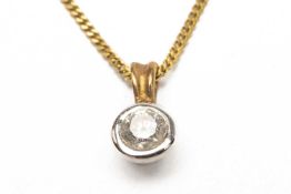 9CT GOLD DIAMOND PENDANT, the single stone measuring 0.25cts approx., rub over setting, on fine