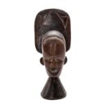 IDOMA HEAD CREST, Nigeria, with flat rear flange supporting rear standing figure, 36cms high