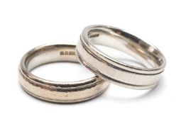 TWO WEDDING BANDS, comprising an 18ct white gold example, ring size K, 7.0gms and a platinum