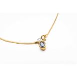 18CT GOLD SAPPHIRE & DIAMOND PENDANT on yellow gold chain stamped '750', 7.6gms Provenance: deceased