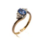9CT GOLD SAPPHIRE & DIAMOND RING, the central sapphire (6 x 4mms approx.) flanked by six diamonds in