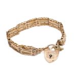 9CT GOLD GATELINK BRACELET & PADLOCK CLASP, with safety chain, padlock clasp engraved 'Cadi from