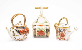 THREE ROYAL CROWN DERBY CHINA MINIATURES, comprising tea kettle and cover, watering can and lawn