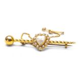 YELLOW METAL HEART SHAPED MOONSTONE & SEED PEARL BAR BROOCH, unmarked, 3.3gms Provenance: private