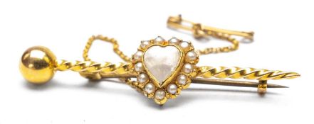 YELLOW METAL HEART SHAPED MOONSTONE & SEED PEARL BAR BROOCH, unmarked, 3.3gms Provenance: private