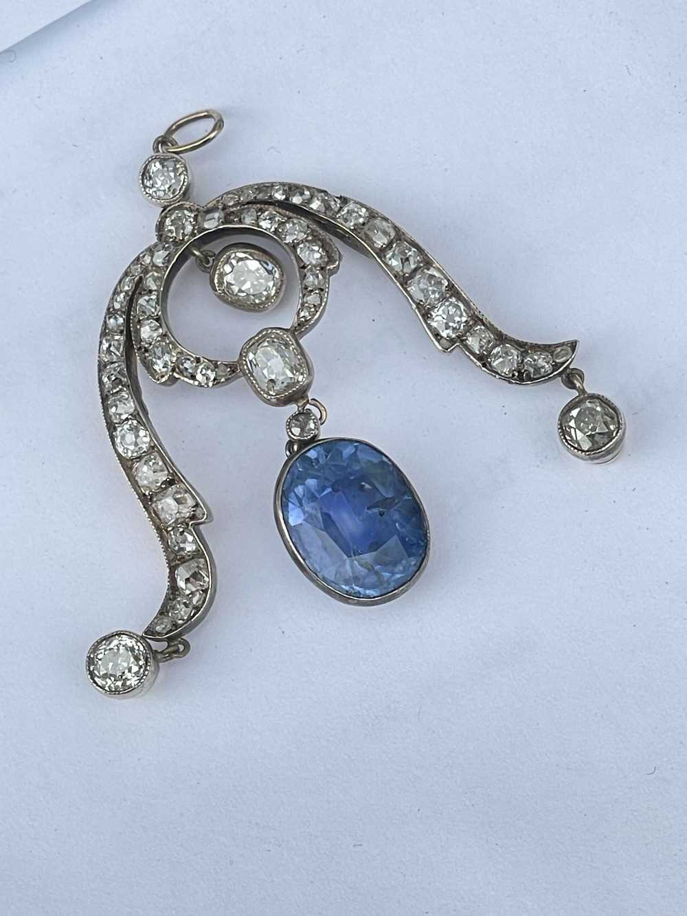 WHITE & YELLOW METAL SAPPHIRE & DIAMOND DROP PENDANT, set with graduated old cut diamonds and one - Image 18 of 26