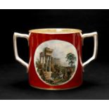 19TH CENTURY PRATTWARE LOVING CUP, decorated with opposing panels of Roman ruins, 14.25cms high