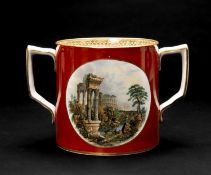 19TH CENTURY PRATTWARE LOVING CUP, decorated with opposing panels of Roman ruins, 14.25cms high