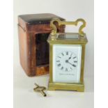 GILT BRASS FIVE-GLASS CARRIAGE CLOCK, E. Johnson & Son, Derby retailers mark to the Roman enamel