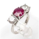 PLATINUM THREE STONE DIAMOND & RUBY RING, the central round cut ruby (8mm diameter approx.)