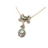 EDWARDIAN EMERALD & DIAMOND BOW PENDANT, on 14ct gold fine chain, 7.1gms Provenance: deceased estate