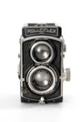 A BABY ROLLEIFLEX 2.8F TLR CAMERA - black, serial no. 642660, with a Carl Zeiss Jena, Tessar f/2.8