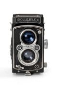 A ROLLEIFLEX 3.5F MEDIUM FORMAT CAMERA - black, serial no. 1163204, with Carl Zeiss Jena, Tessar f/