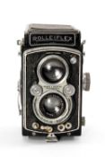 A ROLLEIFLEX 3.5F MEDIUM FORMAT CAMERA - black, serial no. 667845, with Carl Zeiss Jena, Tessar f/