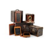 TWO CASED BELLOW CAMERAS AND FILM PLATES (2) Comments: leather on cases worn