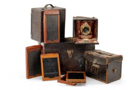 TWO CASED BELLOW CAMERAS AND FILM PLATES (2) Comments: leather on cases worn