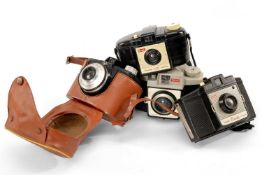 FOUR VARIOUS CAMERAS, comprising Kodak 'Brownie' 127, Kodak 'Brownie' Cresta, Kodak 'Brownie' Cresta