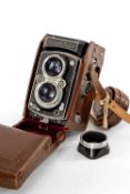 A ROLLEIFLEX 3.5F MEDIUM FORMAT CAMERA - black, serial no. 1206345, with Carl Zeiss Jena, Tessar f/